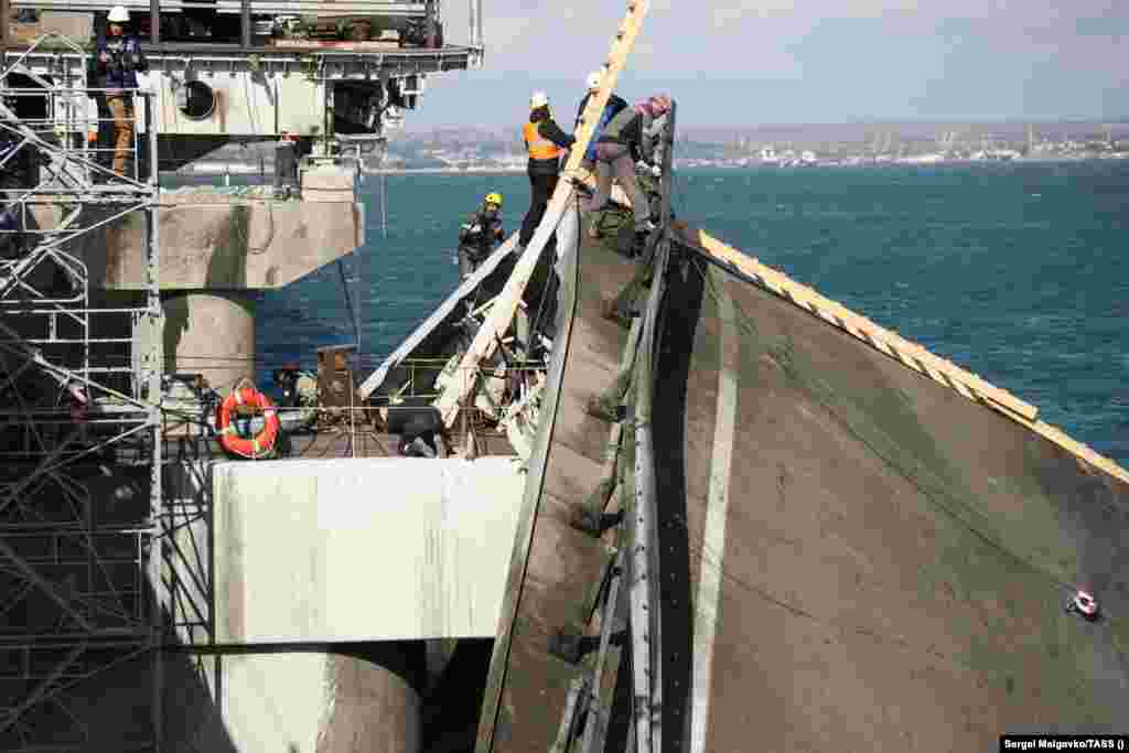 Moscova spune că explozia, care a ucis trei oameni, a fost opera serviciilor speciale ucrainene, și a lansat pe 10 octombrie în chip de represalii un val de atacuri cu rachete în Ucraina&nbsp;care au ucis&nbsp;cel puțin 19 oameni în mai multe orașe.