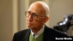 The 84-year-old scientist and professor Dariush Farhud said two men dressed in black "who looked like agents" greeted him and "got into my car" on the morning of October 30. 