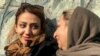 Maryam Karimbeigi (left), the sister of Mustafa Karimbeigi, a 26-year-old protester who was shot and killed by Iranian security forces in 2009, pictured with her mother, Shahnaz Akmali. 
