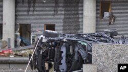 На месте взрыва в Осло обнаружена искореженная машина 