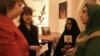 Catherine Ashton (L), the European Union's top foreign policy diplomat, at a meeting with Narges Mohammadi (right), an Iranian human rights activist and mother of Sattar Beheshti, who died in Iranian custody.