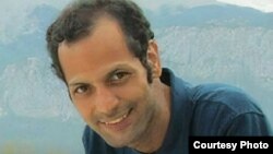 سینا قلندری، خبرنگار لرستانی محکوم به حبس