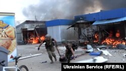 Орус армиясынын ракетасы Славянск шаарындагы базарга тийген. 6-июль, 2022-жыл. 