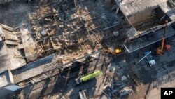 Кременчуг шаарындагы соода борбору соккудан кийин. 28-июнь, 2022-жыл.