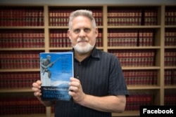 Професор Кевіна Джон Гелера