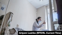 Anasztázia Volosina egy beteggel