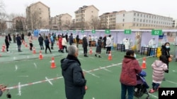 Red za masovno testiranje u Kini, u gradu Tianjin na severu države, 12. januar 2022. 