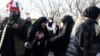Female spectators gather outside the Mashhad stadium before the match between Iran and Lebanon in March.