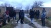 The detained men's relatives said on February 9 that no reason was given for the searches or the detention of the four men.