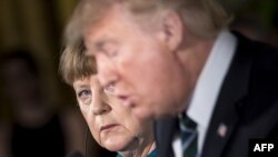 Меркель: спочатку треба вирішити ситуацію в Україні