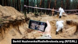 Массовое захоронение в Изюме