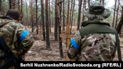 масовно гробница во близина на Изум, Украина, 15 септември 2022 година
