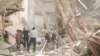 Rescue crews work at the site of a collapsed building in Abadan, Iran, on May 23.