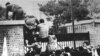 Iranian students climb over the wall of the U.S. Embassy in Tehran on November 4, 1979.