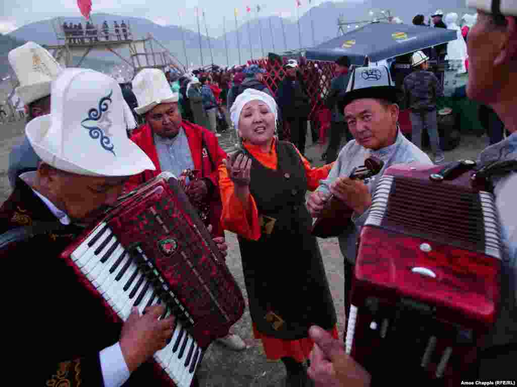 Nazira Ivanova rehearses with her bandmates before taking the stage at an event for traditional music. The song, which stopped several passersby in their tracks, was &quot;about love,&quot; she told RFE/RL.&nbsp;