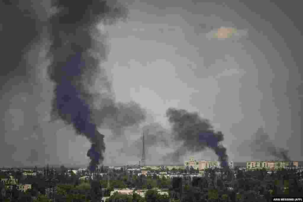Smoke rises above Syevyerodonetsk during heavy fighting on May 30 as Russian troops inched closer to seizing the key eastern city.