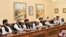 Mullah Abdul Ghani Baradar (third left) leads the Taliban delegation that attended a meeting at the Foreign Affairs Ministry in Islamabad on October 3.