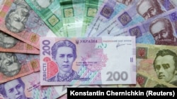 Група осіб з Києва та Криму у своїй схемі використовували заборонені в Україні платіжні системи WebMoney, Qiwi, «Мир» і криптовалюти