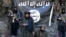 In a video viewed by RFE/RL on August 6, IMU leader Usman Ghazi and his fighters are shown taking an oath of allegiance, in Arabic, to IS and its leader Abu Bakr al-Baghdadi. 