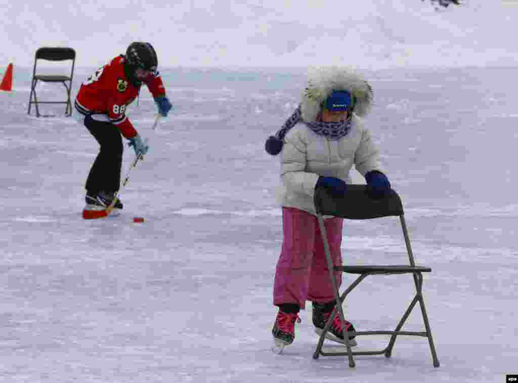 Обучение фигурному катанию в Иллинойсе.