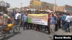 Retirees protest in Shoosh on June 6.