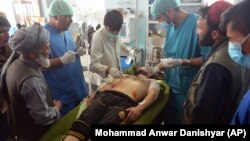 An Injured man receives treatment at a hospital in Ghazni Province on August 12.