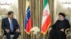 Venezuelan President Nicolas Maduro (left) meets with his Iranian counterpart, Ebrahim Raisi, in Tehran on June 11. 