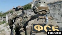 The six men were taken away by officers of Russia's Federal Security Service. (file photo)