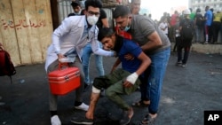 Учасники протестів у центрі Багдаду, 12 листопада 2019 року