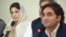 FILE: Pakistani opposition leader Bilawal Bhutto-Zardari, Chairman Pakistan Peoples Party (PPP) listens to Maryam Nawaz (L), daughter of currently incarcerated former Prime Minister Nawaz Sharif during a press conference in May.