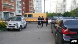 Ruske snage bezbednosti na mestu pada jednog od dronova u moksovskoj regiji 22. avgusta, ilustrativna fotografija