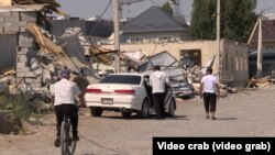 Көк-Жар-2 конушунда бузулган үйлөр.