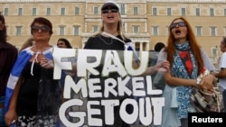 Demonstranti protiv posete Angele Merkel, 9. oktobar 2012.