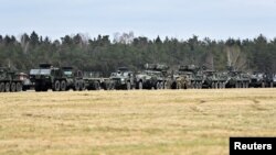 Vehicule de luptă Gear și Stryker în drum spre România de la baza din orașul german Vilsek/Germania. Foto: 09.02.2022