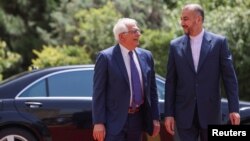 Евробиримдиктин тышкы иштер жана коопсуздук саясаты боюнча өкүлү Жозеп Боррел жана Ирандын тышкы иштер министри Хосейн Амир Абдоллахиян.