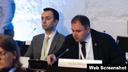 "ქართული ოცნების" დეპუტატები ლევან მახაშვილი და ნიკოლოზ სამხარაძე პორტოში, ეუთოს საპარლამენტო ასამბლეის [OSCE PA] სესიაზე.