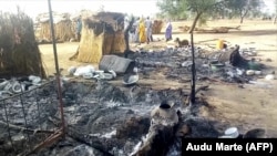 Spaljeno selo posle napada pripadnika džihadističke grupe Boko haram na severoistoku Nigerije, 28. jul 2019.