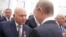 Юрий Лужков и Владимир Путин