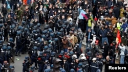 Сблъсъци по време на протестите срещу пенсионната реформа във Франция. 