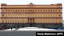 A man walks past the headquarters of the Federal Security Service (FSB), the successor to the KGB, in central Moscow.