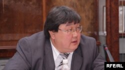 Зайнидин Курманов.