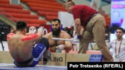 Athletes at the 2024 World Nomad Games compete in mas wrestling, a one-on-one stick-pulling game attributed to the Yakut people of Siberia.