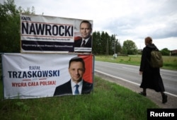 Виборчі банери головних кандидатів на пост президента Польщі