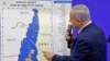 ISRAEL -- Israeli Prime Minister Benjamin Netanyahu points at a map of the Jordan Valley as he gives a statement in Ramat Gan, near the Israeli coastal city of Tel Aviv, September 10, 2019