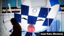 Mural sa Miraitovom, zaštitnim likom Olimpijskih igara u Japanu, Tokijo, 22. januar 2021. godine