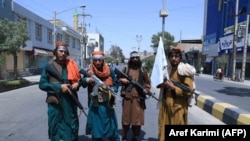 Afganistan: Luftëtarë talibanë, në një rrugë në Provincën Herat, (19 gusht 2021)