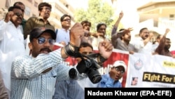FILE: Pakistani journalists protest during the World Press Freedom Day in Hyderabad on May 3.