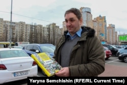 Микола Малуха з книгою «Велике Будівництво-2020. Обличчя»