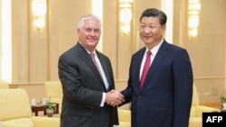 Зустріч голови КНР Сі Цзіньпіна (п) та держсекретаря США Рекса Тіллерсона, Пекін, 30 вересня 2017 року