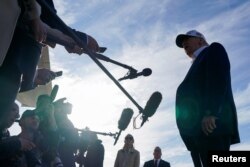 US President Donald Trump speaks to the media before boarding Air Force One in Morristown, New Jersey, on May 25.